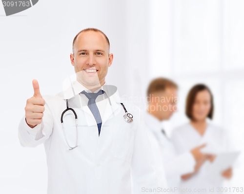 Image of smiling male doctor with stethoscope