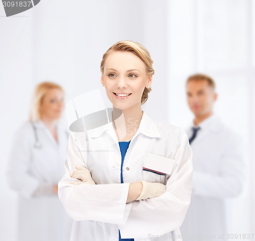 Image of smiling young female doctor in hospital