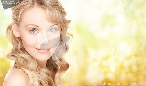 Image of face of beautiful young happy woman with long hair