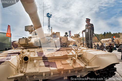 Image of Officer of foreign army studies tank T-72. Russia