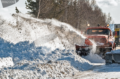 Image of Snowplow removes snow