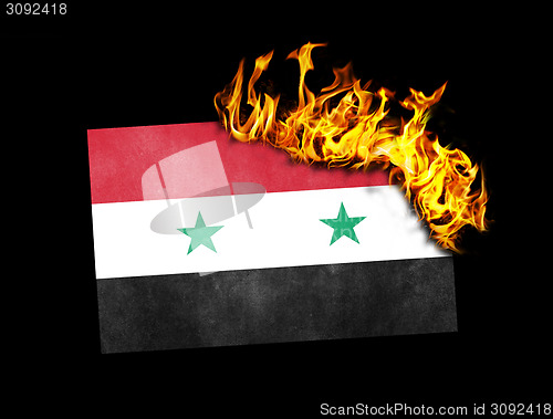 Image of Flag burning - Syria