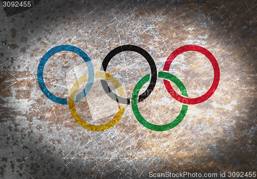 Image of Old rusty metal sign with a flag