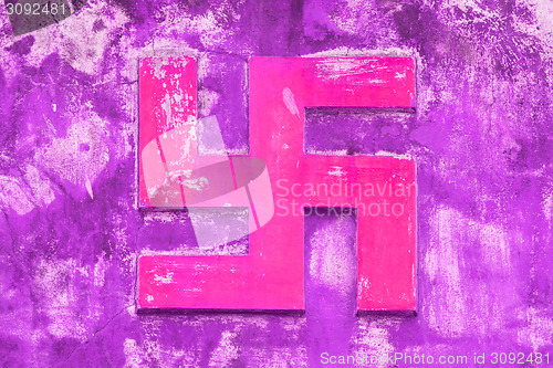 Image of NHA TRANG, VIETNAM 31 JULY 2012 - Swastika symbol on an ancient 