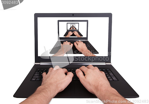 Image of Man working on laptop, visual magic