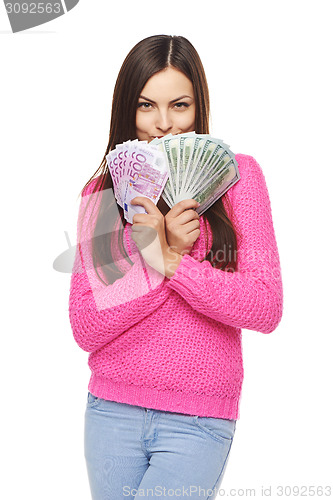 Image of Casual woman with us dollars and euro cash