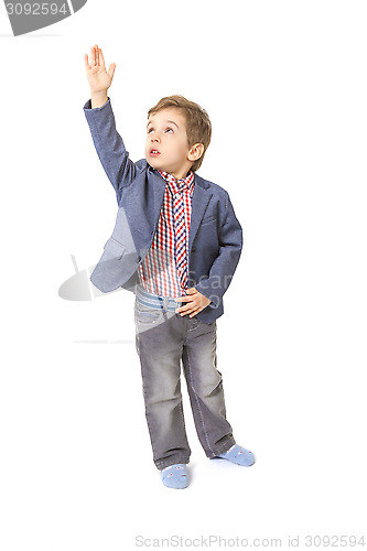 Image of little boy with with his hand lifted up