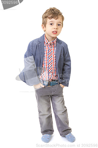 Image of little boy with his hands in pocket 