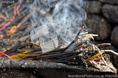 Image of burning incense