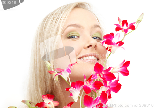 Image of lovely blond with orchid #2