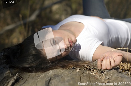 Image of Girl on log