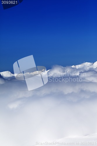 Image of Cloudy mountains at nice sun day