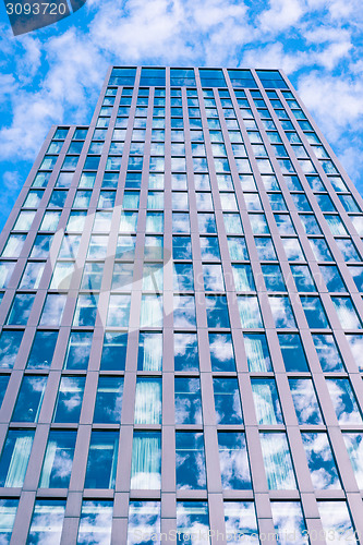 Image of Skyscraper with sky reflection