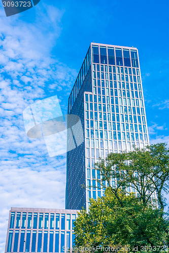 Image of Skyscraper surrounded by nature