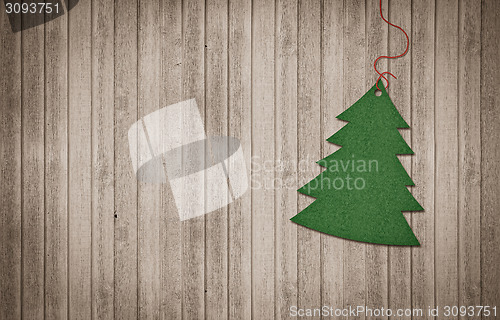 Image of Christmas tree decoration on wood