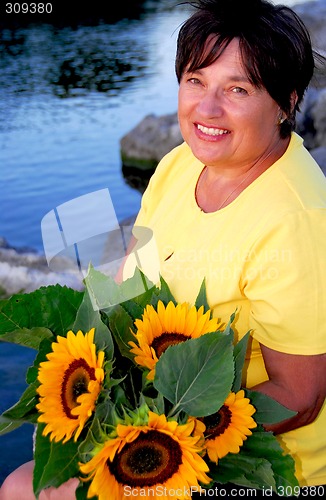 Image of Woman sunflowers