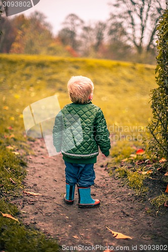 Image of Lonely boy looking at nature