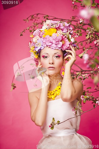 Image of Fresh skin Girl with Spring Flowers on her head