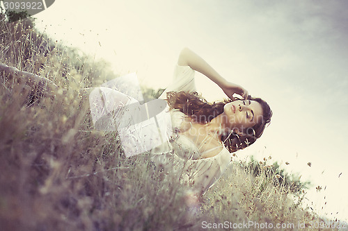 Image of glamour attractive girl in grass
