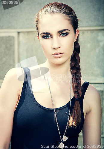 Image of portrait girl with blue eyes and dark lashes