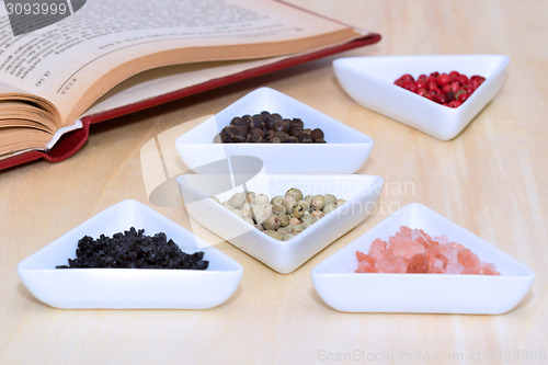 Image of Variety of peppercorns and salt