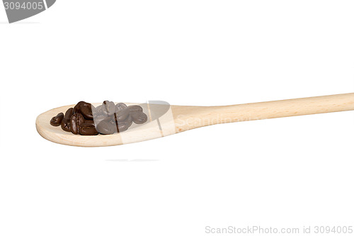 Image of Coffeebeans on a light wooden spoon