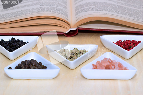 Image of Variety of peppercorns and salt