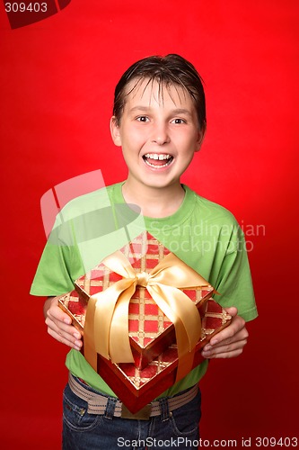 Image of Child holding gift