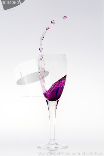 Image of Splashing purple liquid