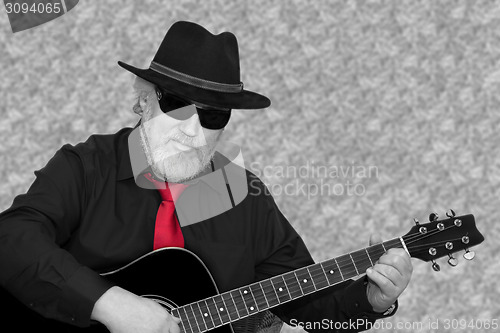 Image of Playing the guitar
