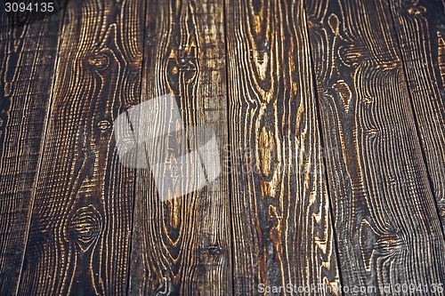 Image of the brown wood texture with natural patterns