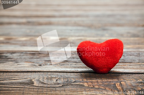 Image of Love heart on breakage wood texture background