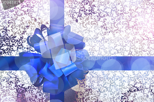 Image of Gift with blue bow and ribbon