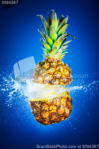 Image of Pineapple splashed with water