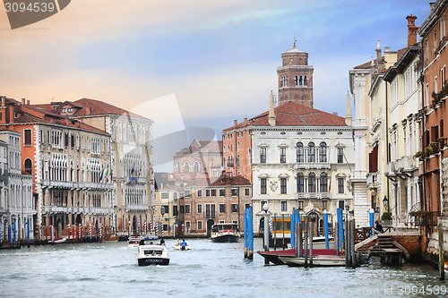 Image of Boats sailing in italian water canal