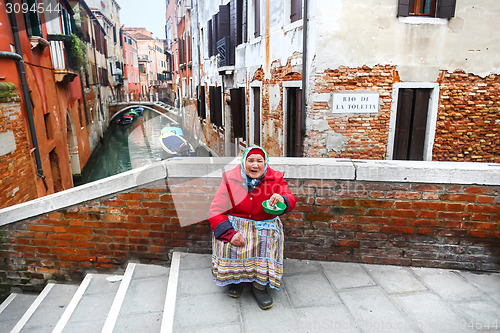 Image of Woman beggar in Venice