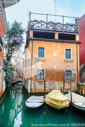 Image of Boats parked in water canal