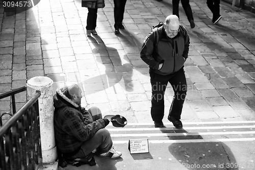 Image of Beggar in Venice bw