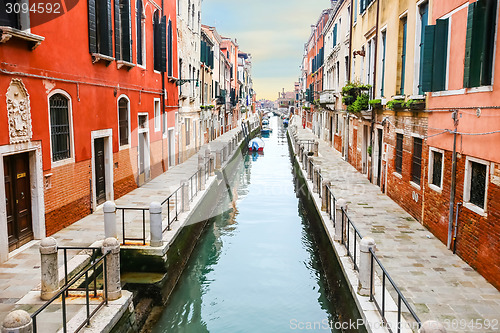 Image of Boats moored along water canal