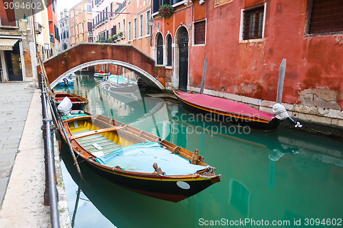 Image of Gondolas parked in water canal