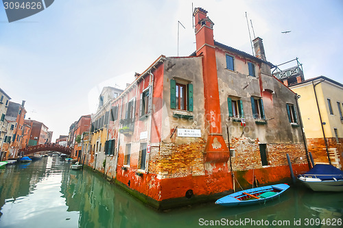 Image of Empty boats parked in water canal