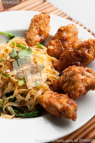 Image of Chicken Wings with Noodles and Spinach