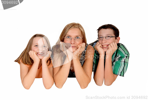 Image of Family lying on floor.