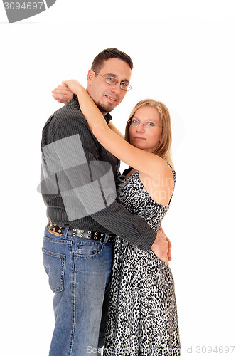 Image of Husband and wife embracing.