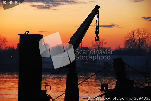 Image of Boat cran and sunset at Sava river