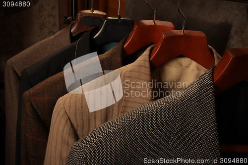 Image of several coats on hangers