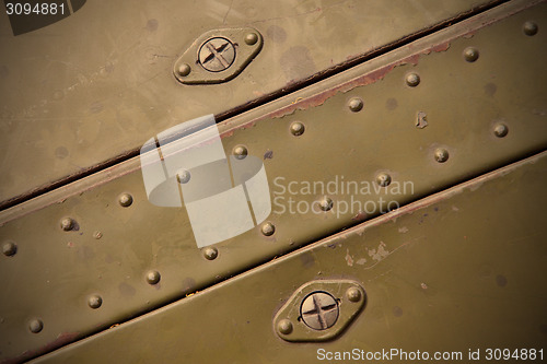 Image of metal surface with rivets
