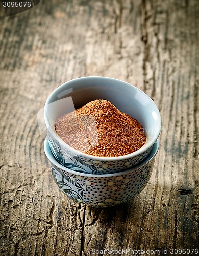 Image of bowl of cinnamon powder