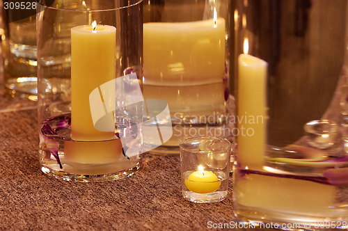 Image of Different candleholders of glass