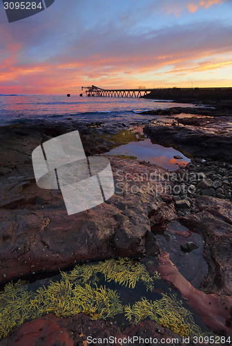 Image of Sunrise from Bass Point with Gravel Loader pier in distance